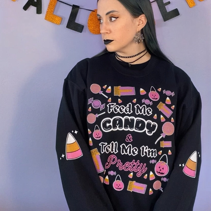 Feed Me Candy Crewneck Halloween Sweatshirt with Candy Corn Sleeves (BLACK)